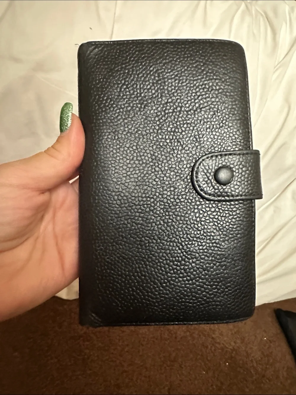 CHANEL Black Quilted CC Caviar Leather wallet.